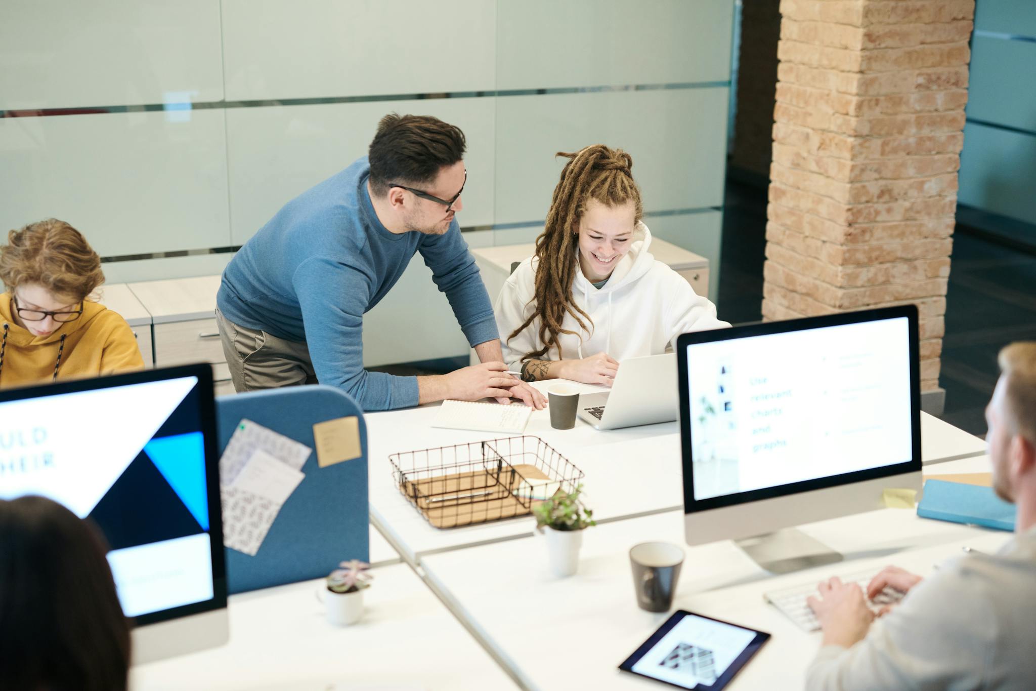 A diverse team of colleagues working together in a modern office environment.